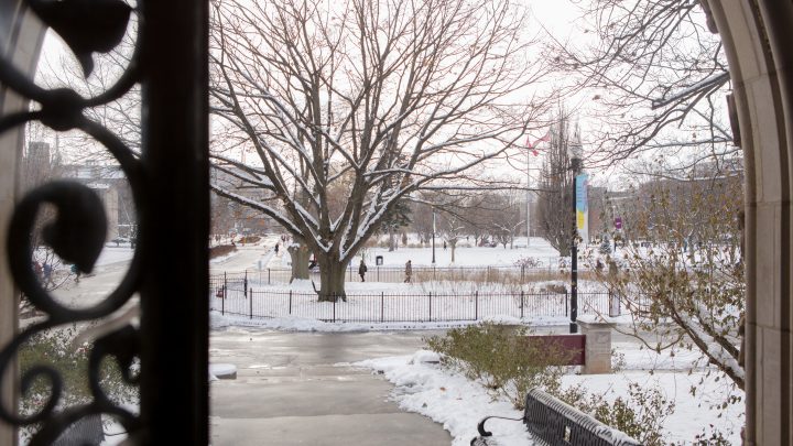 The view of JHE field from the University Hall entrance in the winter.