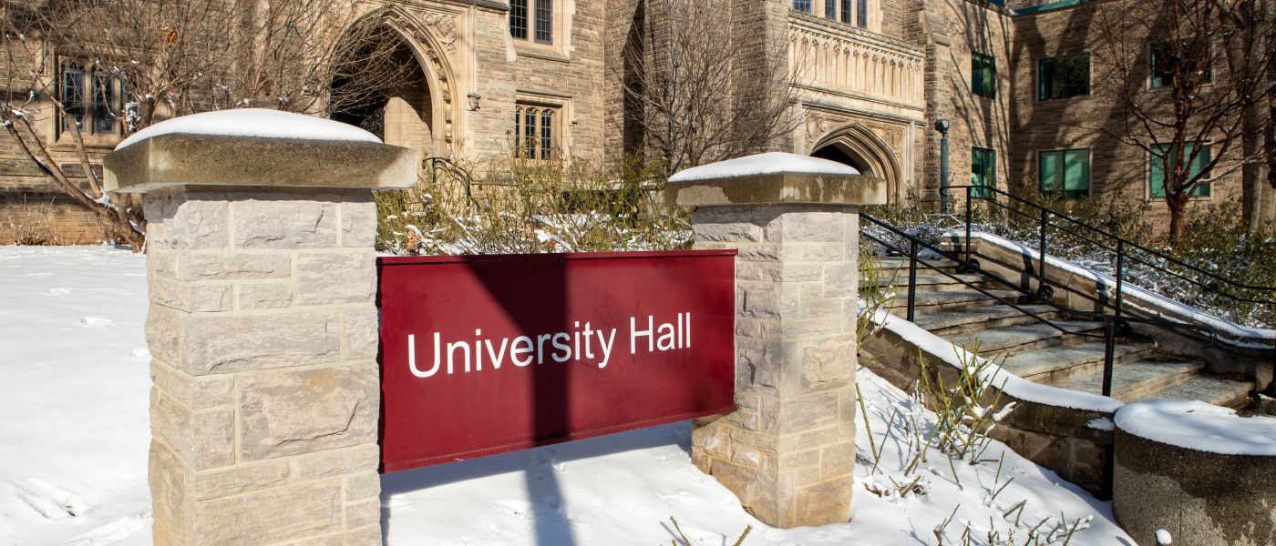 Front entrance and identifying sign for University Hall.
